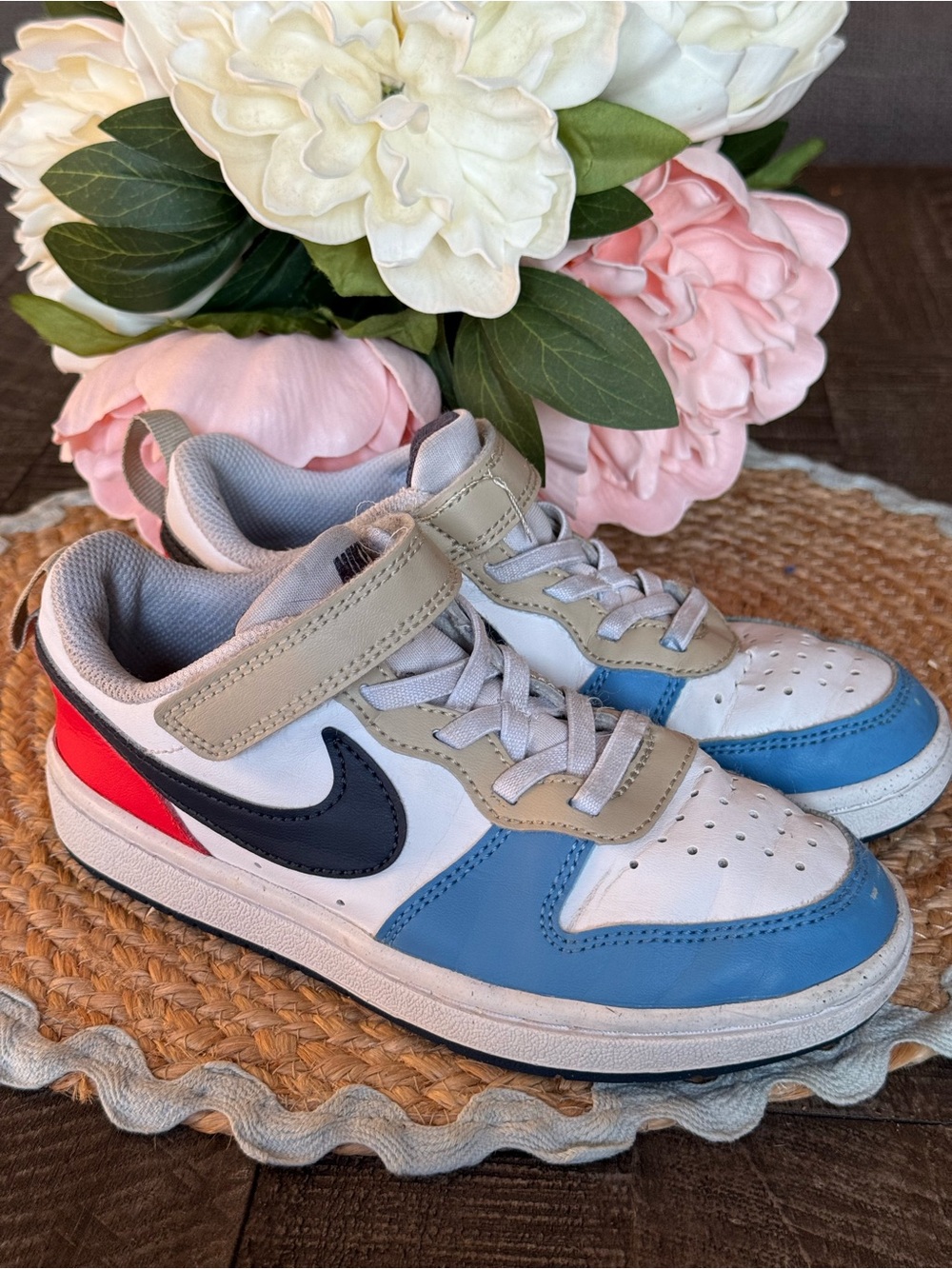 Nike Kids White, Blue & Black Sneakers with Red Accent